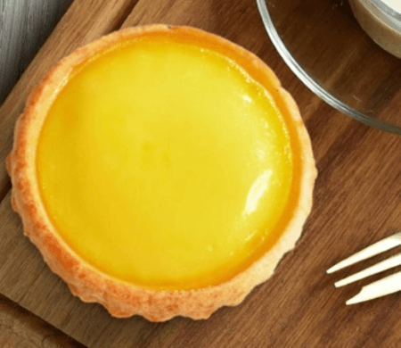 Tai Cheong: Buy Three Get One Free Egg Tart while exploring Hong Kong and taste one of the city’s famous traditional egg tarts, a must try Hong Kong food experience for visitors.